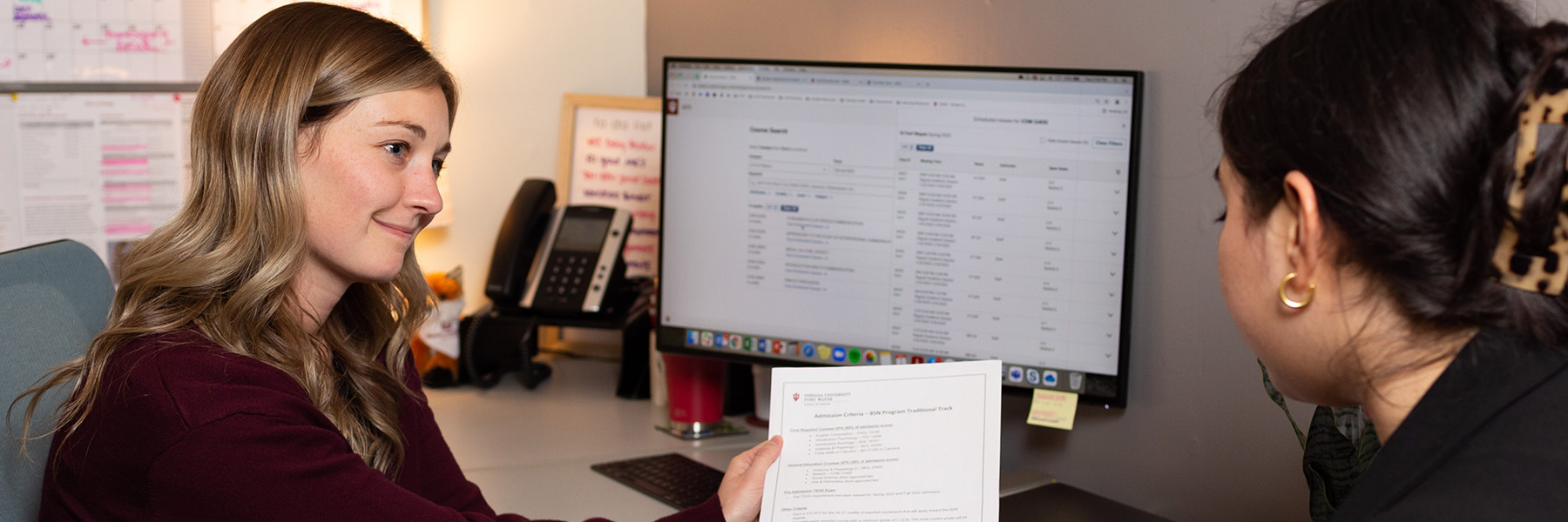 Counselor talking with student