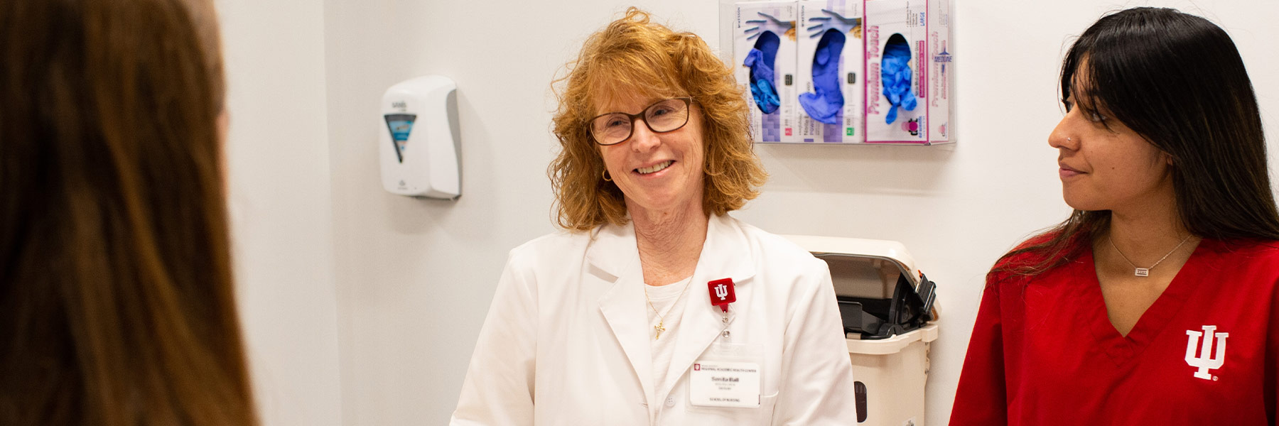 Nurse instructing students