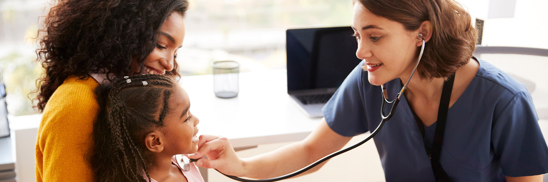 Nurse with patient and mother