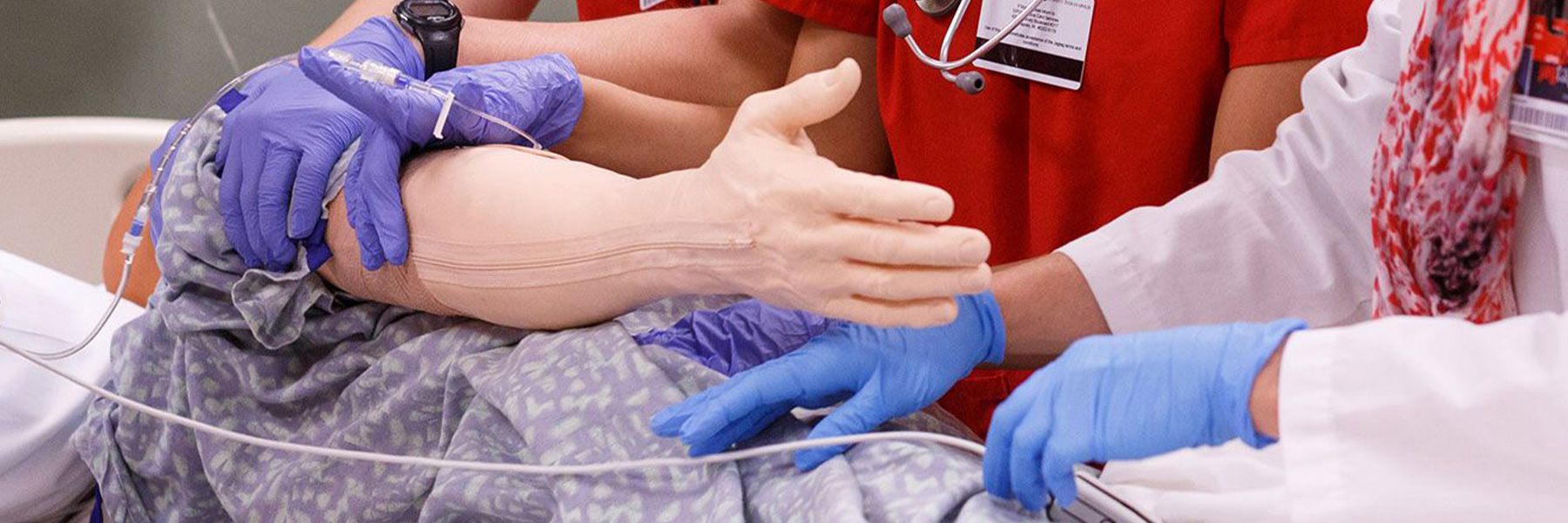 Close up of nurses and instructor in the Simulation and Skills lab