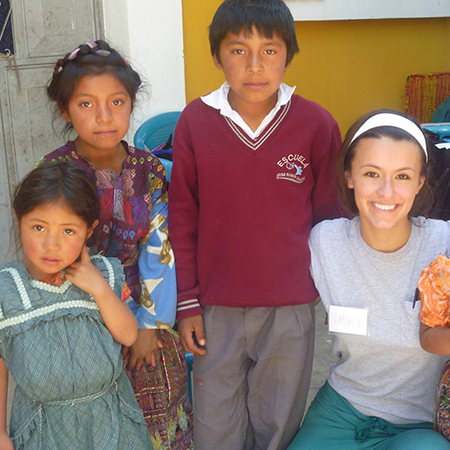 Children at study abroad location with nurse