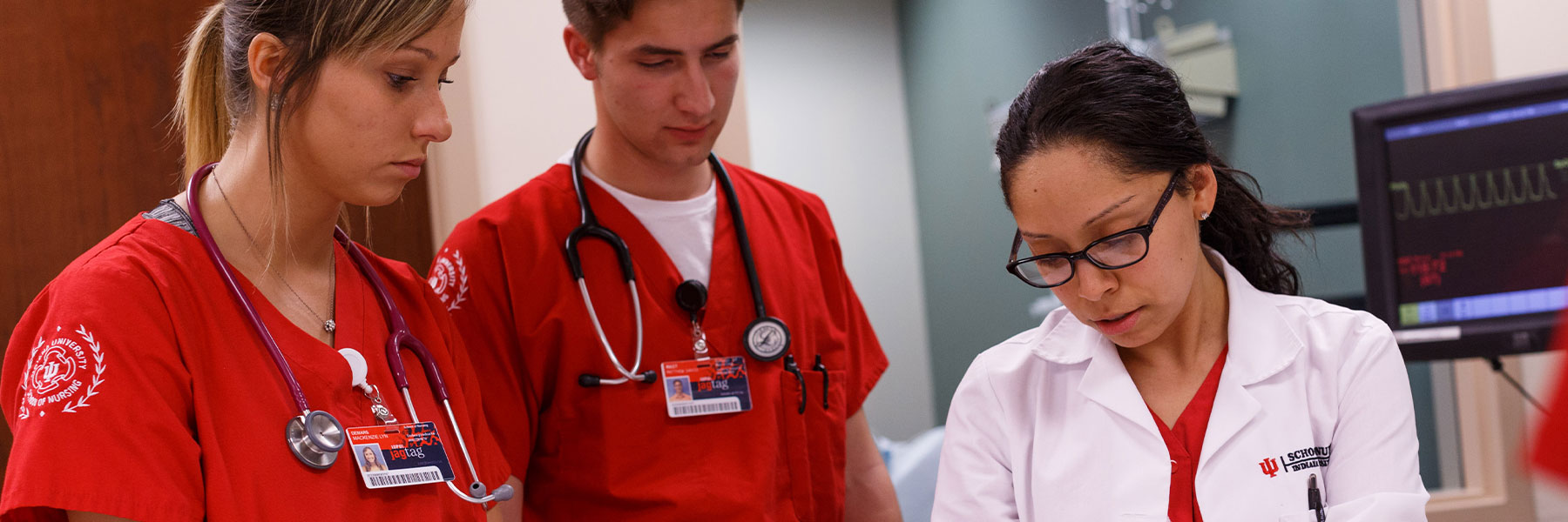 Instructor assisting students during class