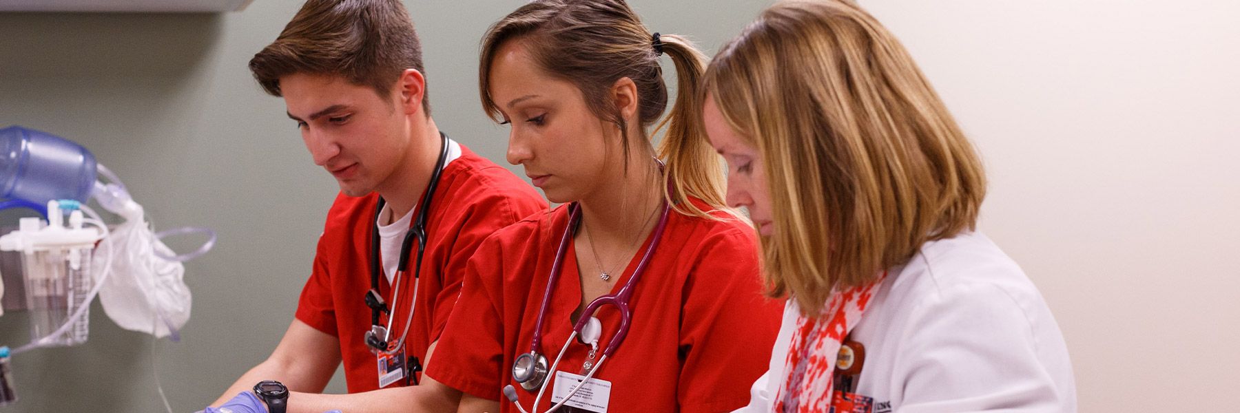 Nursing students with instructor
