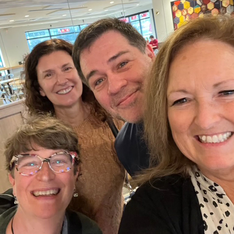 Greg Carter and three other IU nurses smile for a selfie