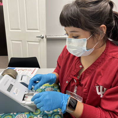 An IU School of Nursing student completed a test during a regional clinic experience.