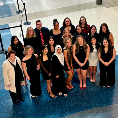 Traditional BSN graduates pose for a photo prior to the IU School of Nursing in Fort Wayne pinning ceremony.