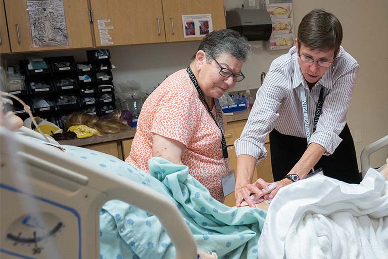 Two women at manikin