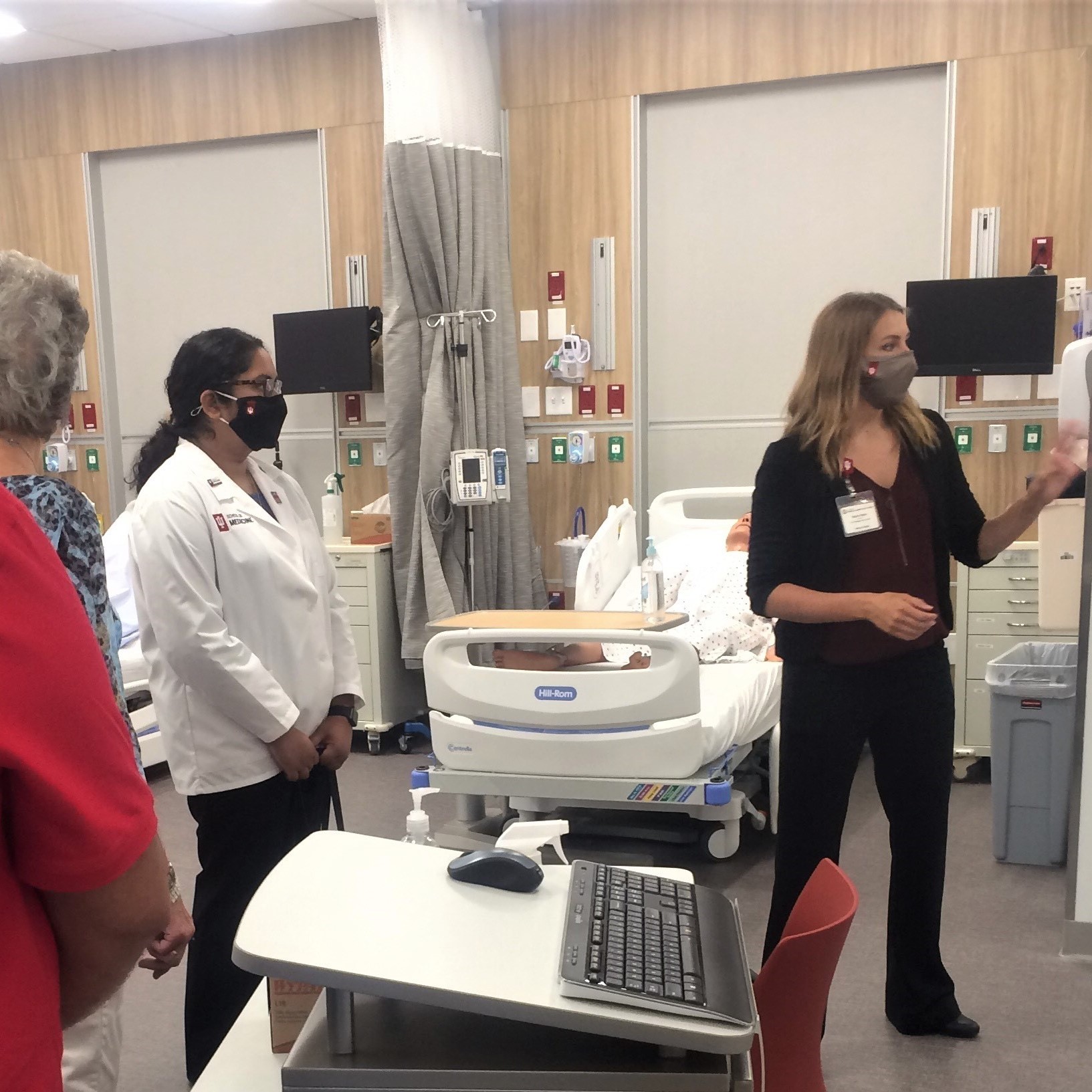 People standing in nursing lab