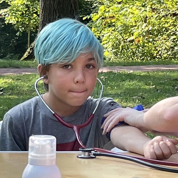 Young student with stethoscope at Science Fest