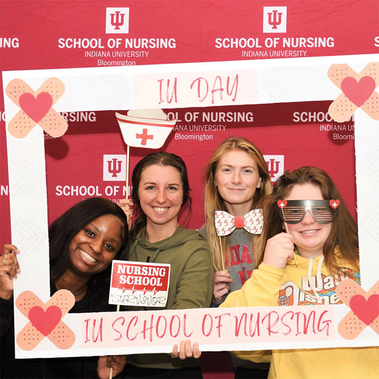 IUSON students in photobooth type frame
